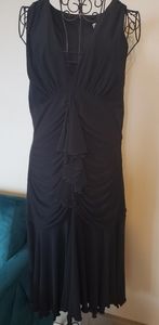 Joseph Ribkoff black rusched midi length dress with ruffle down front